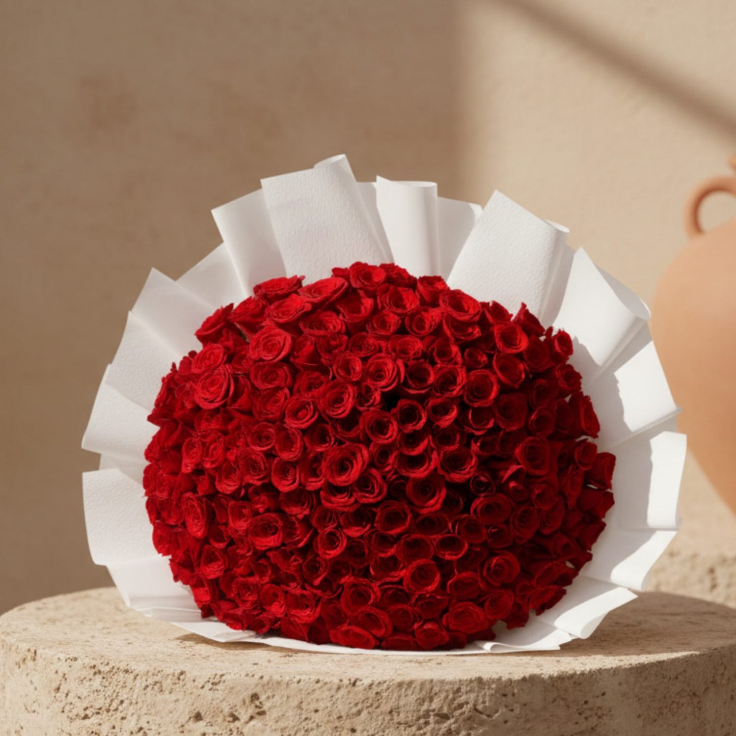 201 Bella hand-tied bouquet with 201 fresh red roses in white wrapping by Aiwa Flowers