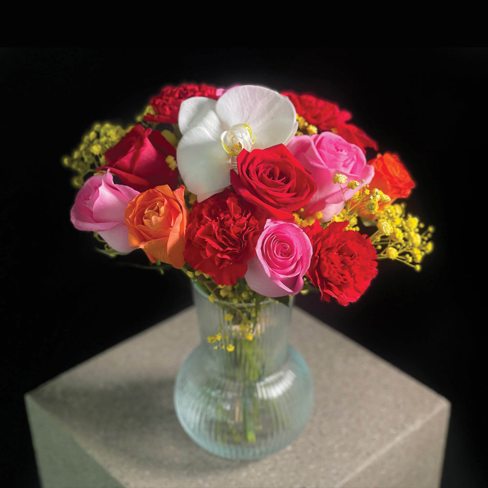 Alice Arrangement in a Clear Vase