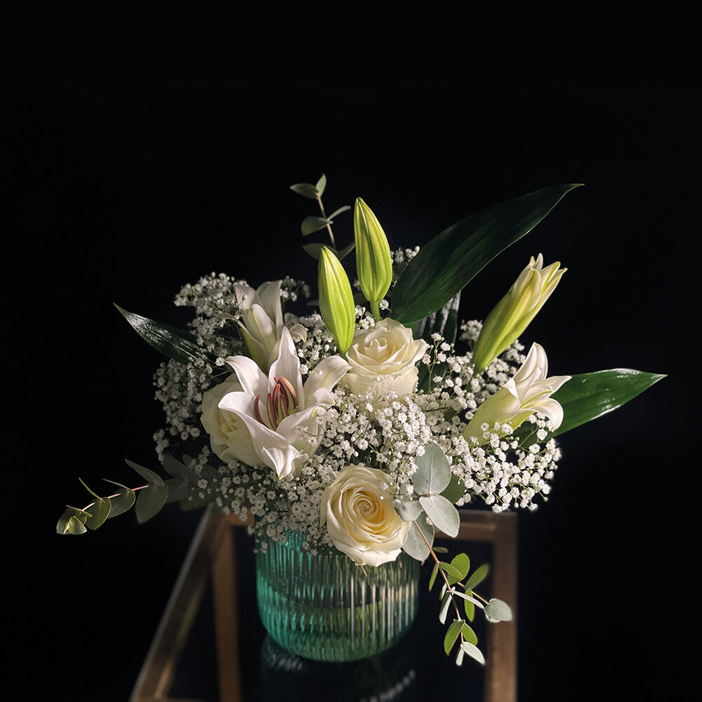 Waltz Arrangement in a Turquoise Vase flowers