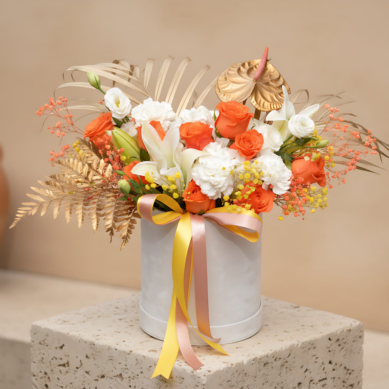 Wonder white velvet flower box with orange roses, lilies, white hydrangea and gold accents