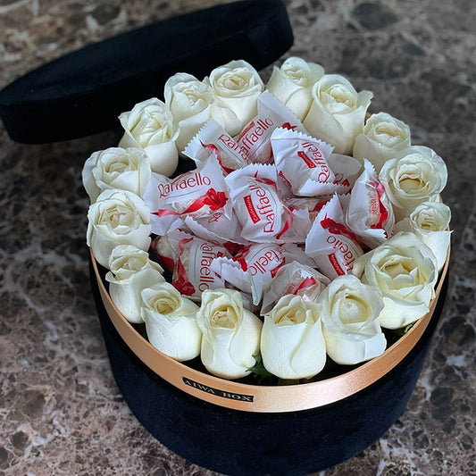 Chocolate with White Roses in a Black Velvet Round Box