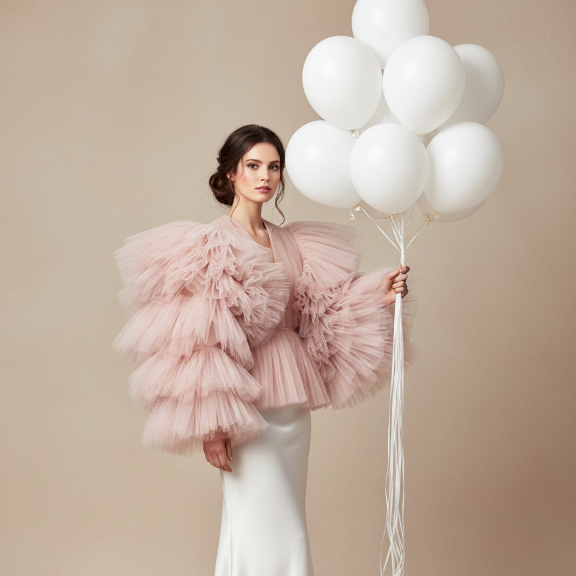 Woman holding bouquet of 10 white helium balloons
