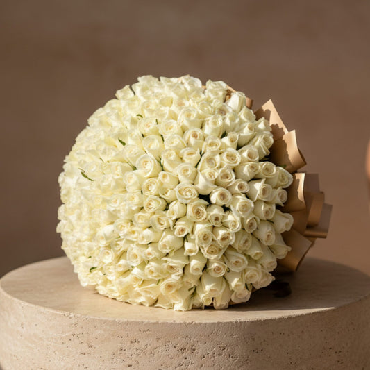 201 Platinum hand-tied bouquet with 201 fresh white roses in gold wrapping by Aiwa Flowers