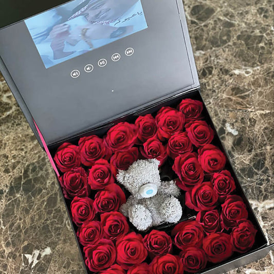 Red Roses in a Video Box with Teddy Bear