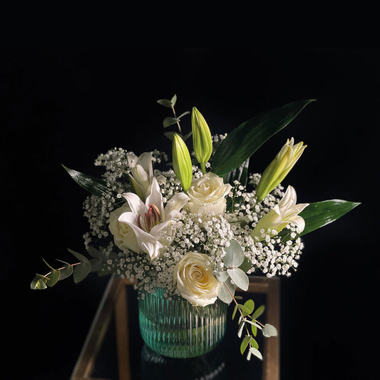 Waltz Arrangement in a Turquoise Vase flowers  