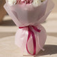 Detail of Deva bouquet pink wrapping and ribbon with hydrangea and white roses.