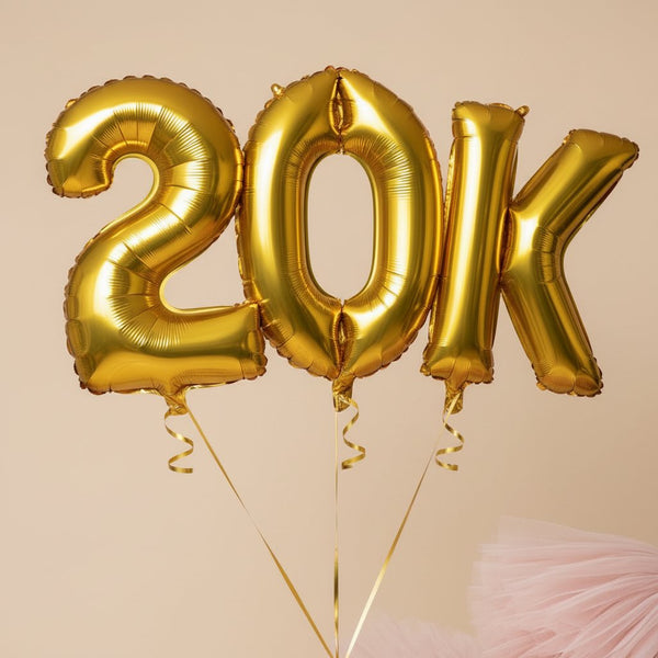gold 20K helium balloon set for milestone celebration