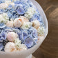 Close-up of blue hydrangea and pink peony in Blue Veil by Aiwa Flowers Dubai