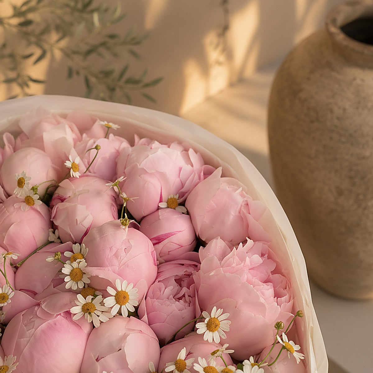 Blush Garden pink peony and chamomile bouquet wrapped in white by Aiwa Flowers Dubai