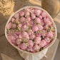 Top-down view of Blush Garden hand-tied bouquet by Aiwa Flowers Dubai