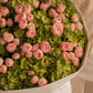 Top-down view of Green Muse hand-tied bouquet by Aiwa Flowers Dubai