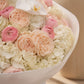 Ivory Orchid white hydrangea orchid and garden rose bouquet wrapped in white by Aiwa Flowers Dubai