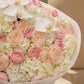 Lifestyle shot of Ivory Orchid refined luxury bouquet by Aiwa Flowers Dubai