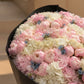 Close-up of pink peony and blue muscari detail in Noctelle by Aiwa Flowers Dubai