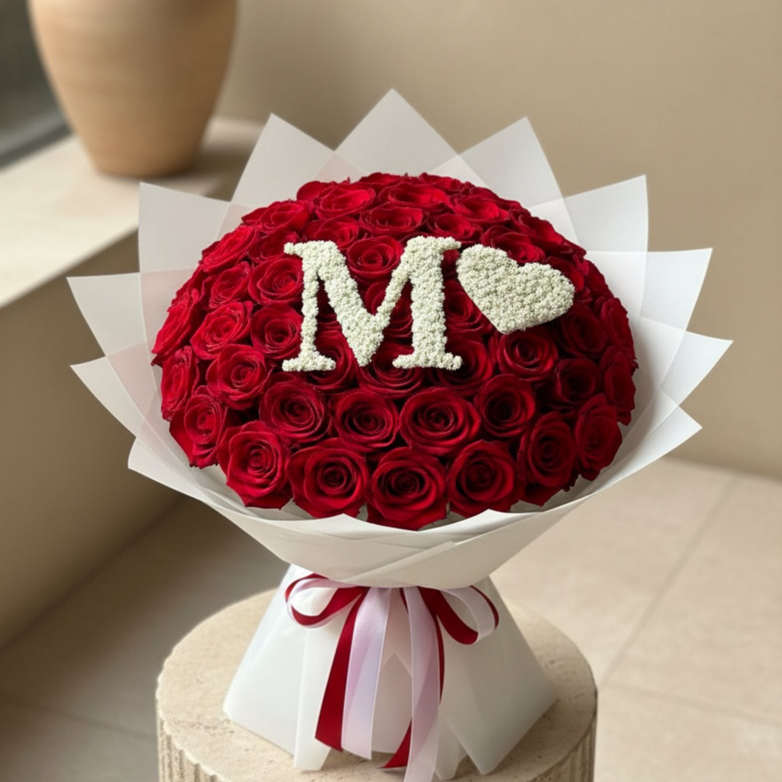 Luxury red rose bouquet with personalized letter made from white gypsophila flowers