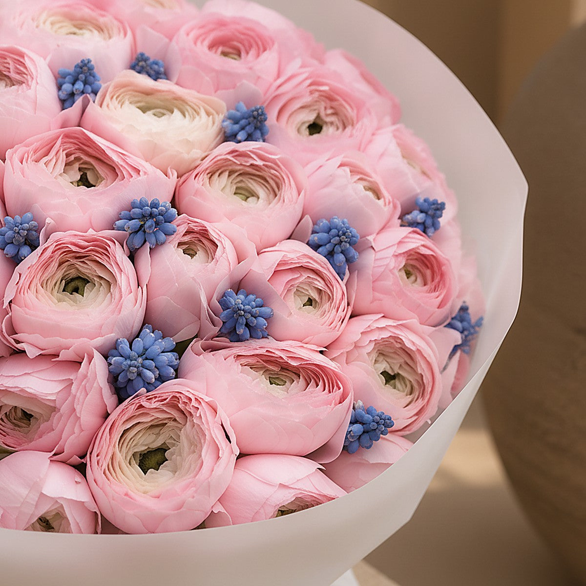 Top-down view of Powder Bloom hand-tied bouquet by Aiwa Flowers Dubai