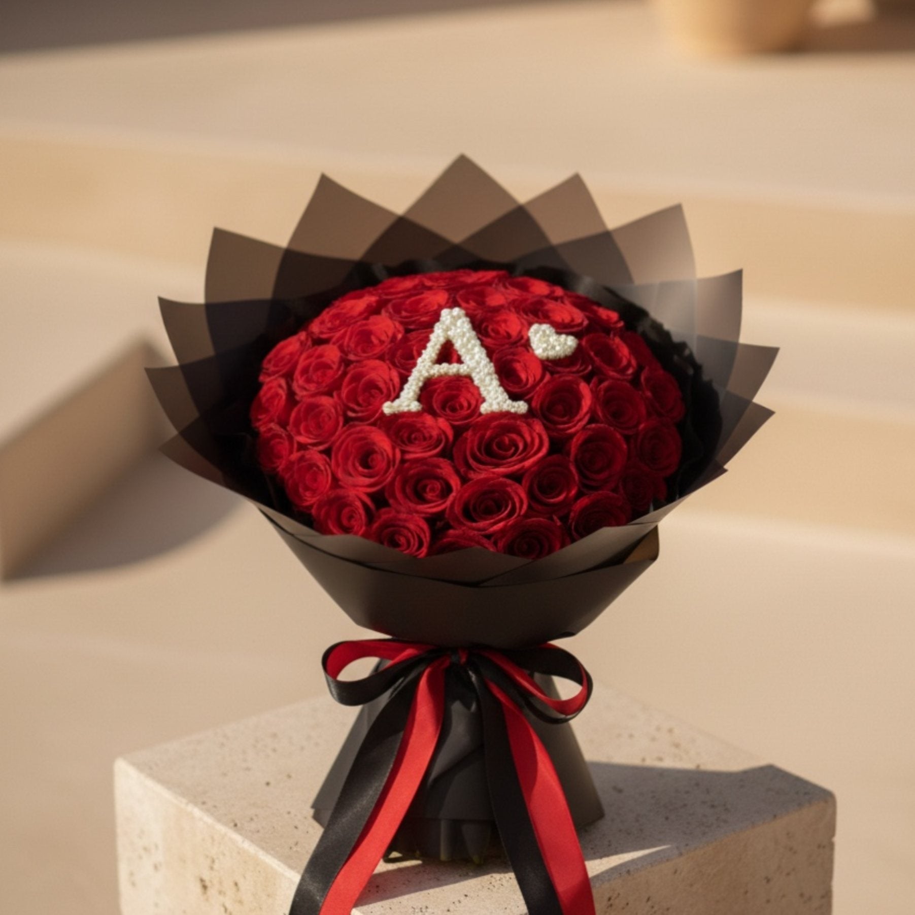 Luxury red rose dome bouquet with custom letter made from white gypsophila flowers
