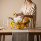 Sunshine Orchid Garden Centerpiece — front view — Aiwa Flowers, Dubai UAE