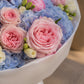 Close-up of blue hydrangea and blush peony in Velour Sky by Aiwa Flowers Dubai