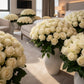 set of white rose arrangements in ceramic vases luxury floral decor Dubai