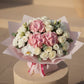 Top view of Pink Theory bouquet with pink hydrangea, white roses, orchid, and delicate white blooms.