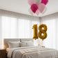 pink white and hot pink helium balloons with custom number decoration bedroom Dubai