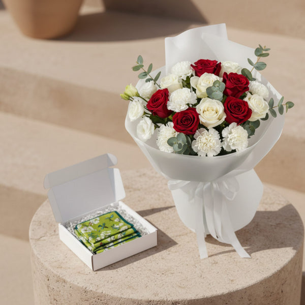 The Way She Loves bouquet with red and white roses, white carnations and eucalyptus paired with silk scarf gift box.