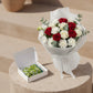 The Way She Loves bouquet with red and white roses, white carnations and eucalyptus paired with silk scarf gift box.