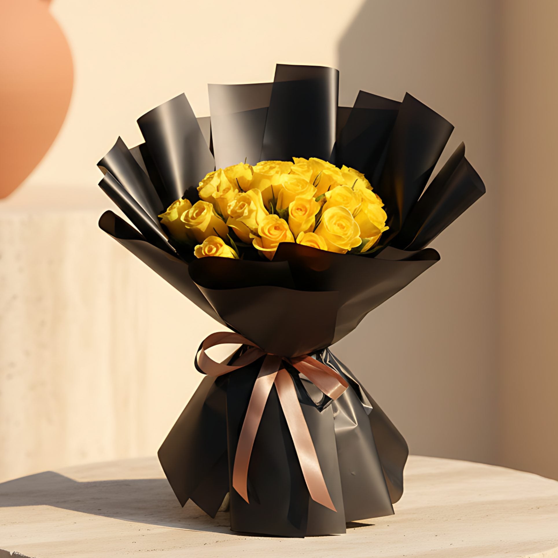 Hand-tied bouquet of 25 fresh yellow roses wrapped in elegant black paper