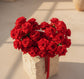 Top view of a red rose heart-shaped bouquet by AIWA Flowers Dubai