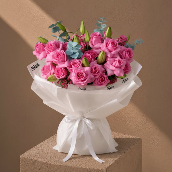 Pink rose bouquet with lily buds and eucalyptus by AIWA Flowers Dubai