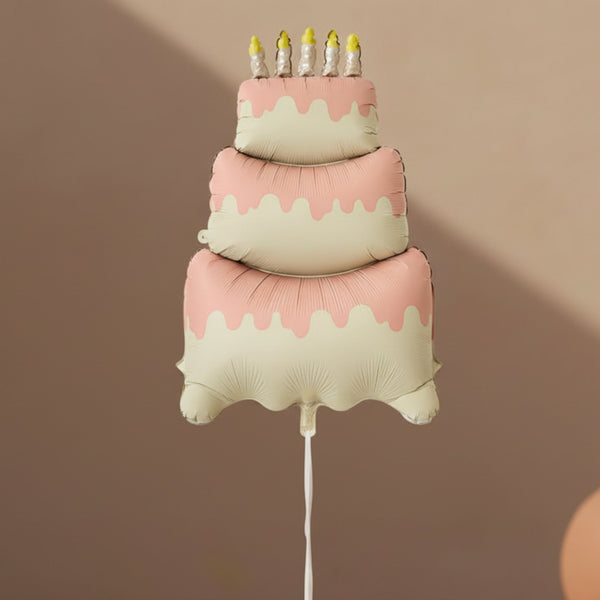 large cake shaped birthday helium balloon with candles