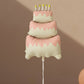 large cake shaped birthday helium balloon with candles