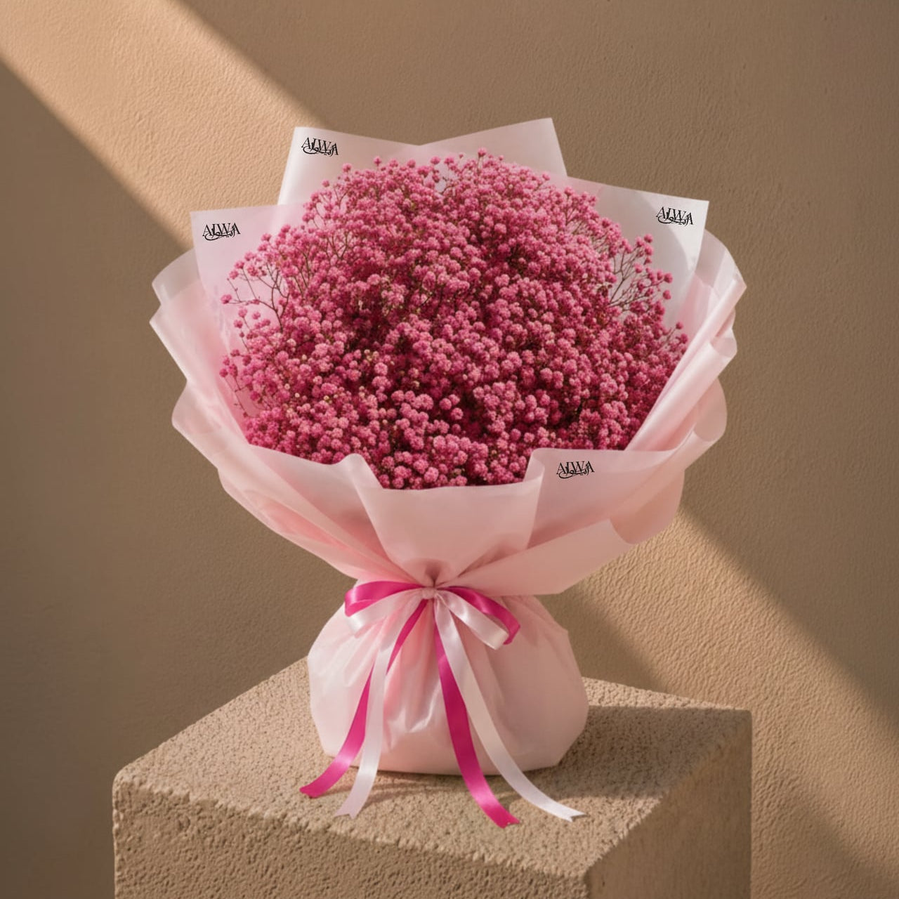 Pink gypsophila bouquet in light pink wrap by AIWA Flowers Dubai