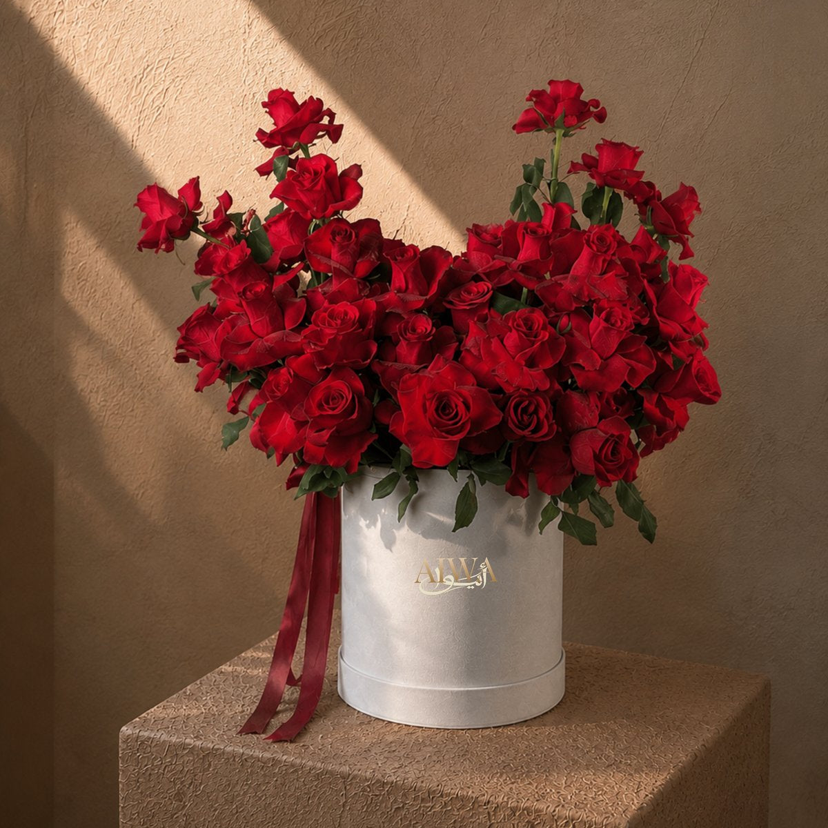 Red roses box bouquet by AIWA Flowers Dubai
