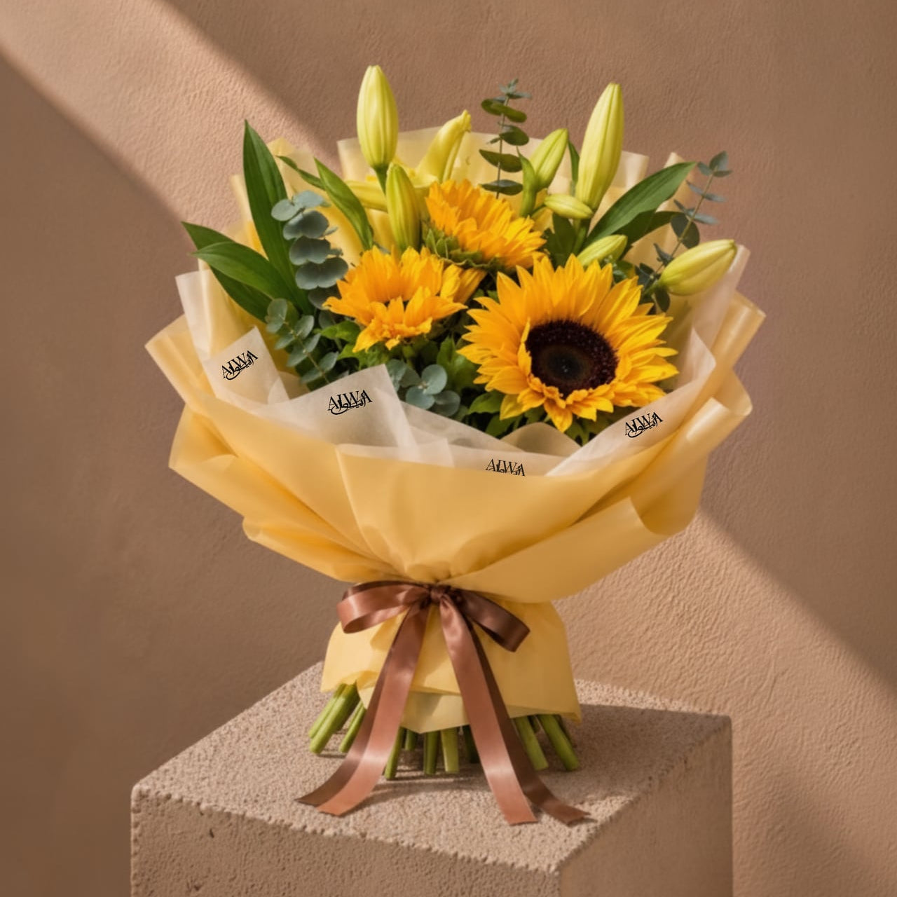 Sunflower and lily bouquet in gold wrap by AIWA Flowers Dubai