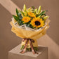 Sunflower and lily bouquet in gold wrap by AIWA Flowers Dubai
