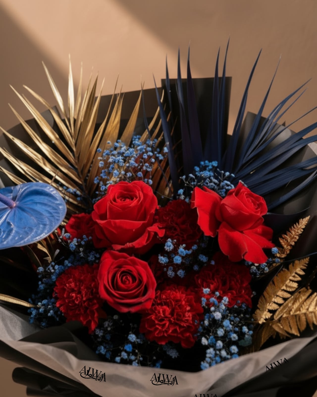 Close-up of red roses, carnations and blue anthurium by AIWA Flowers Dubai