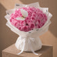 Pink rose bouquet in white wrap by AIWA Flowers Dubai