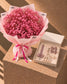 Hoppy Blooms pink gypsophila bouquet with a mauve baby girl gift box by AIWA Flowers Dubai