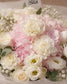 Close-up of white carnations and pink hydrangea by AIWA Flowers Dubai