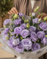 Close-up of purple lisianthus blooms by AIWA Flowers Dubai