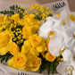 Close-up of yellow roses and white orchid with gypsophila - Mellow Yellow by AIWA Flowers