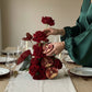 Aiwa Crimson Pomegranate Rose Centerpiece — red roses, anthurium & pomegranate dining centerpiece | Eid Al Adha 2026 Dubai