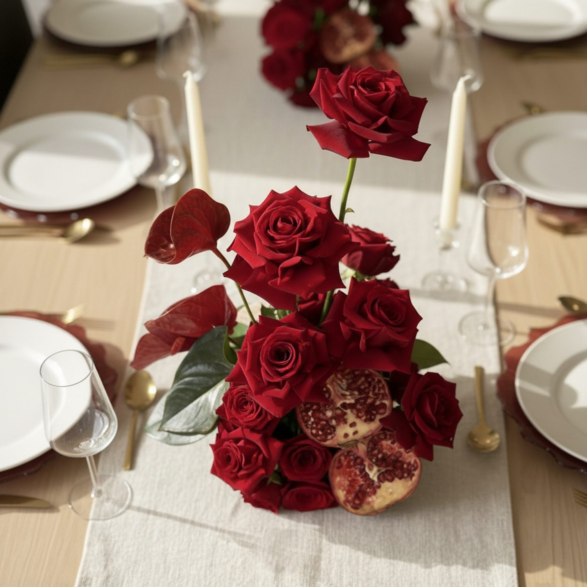 Aiwa Crimson Pomegranate Rose Centerpiece — red rose & split pomegranate detail | premium Eid Al Adha 2026 Dubai UAE