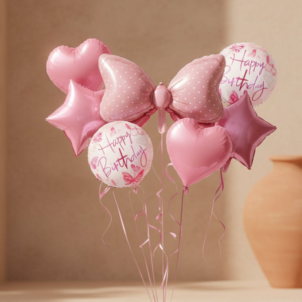 pink bow birthday balloon bouquet with hearts, stars and happy birthday balloons