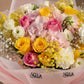 Close-up of pink and yellow roses, pink hydrangea and gypsophila by AIWA Flowers