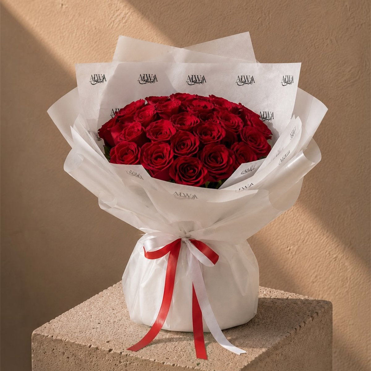 Bouquet of deep red roses in white AIWA wrapping with a red ribbon - Red Love by AIWA Flowers