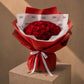 Bouquet of deep red roses in rich red wrapping with a ribbon - Romance by AIWA Flowers