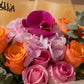 Close-up of purple orchid, pink hydrangea and pink and orange roses - Splendor by AIWA Flowers